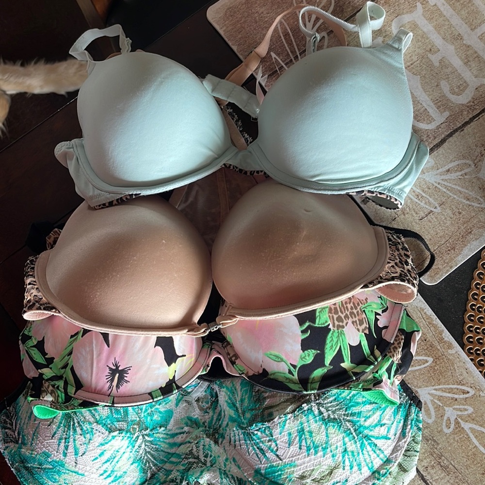 PINK VICTORIA SECRET BRAS.  SIZE 36C.  $40 for all four.  Great condition